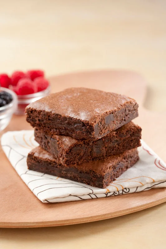 The Original Cakerie (2 Inch x6 Inch ) Uniced Chocolatechunk Brownie Uncut 77 Ounce Size - 2 Per Case.
