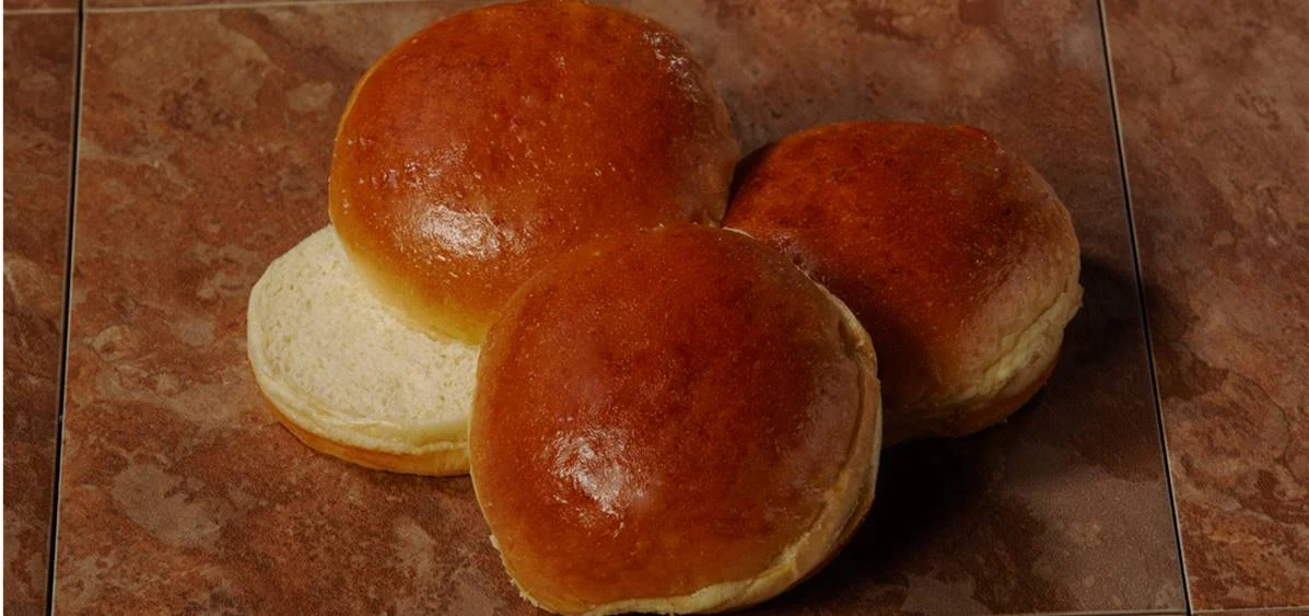 4 Inch  Brioche Hamburger Bun Slice Packs 2.5 Ounce Size - 120 Per Case.
