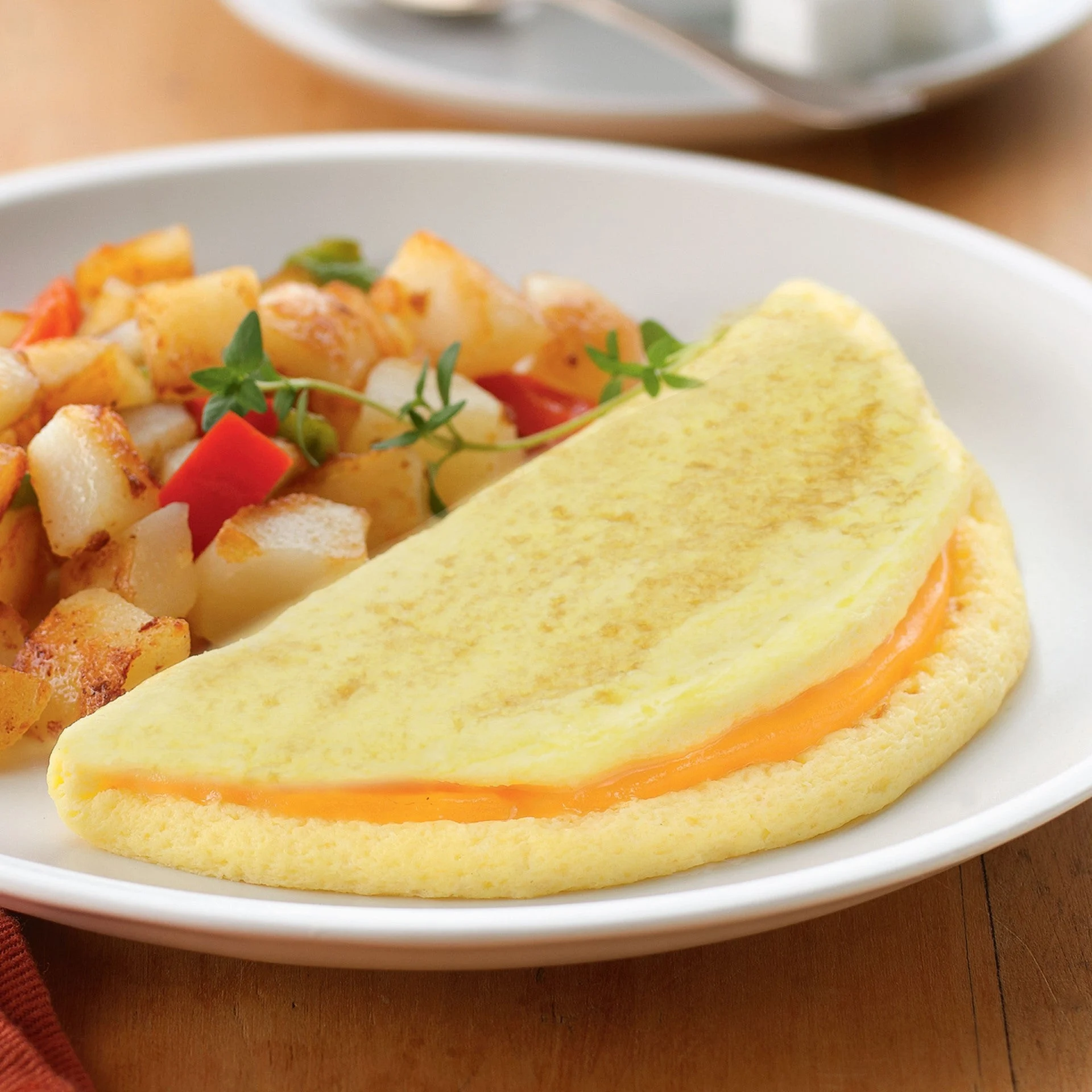 Papetti's(r) Fully Cooked Five Inch Five Inch Singlefold Omelet Filled With Colby Cheese 2.1 Ounce - 144 Per Case