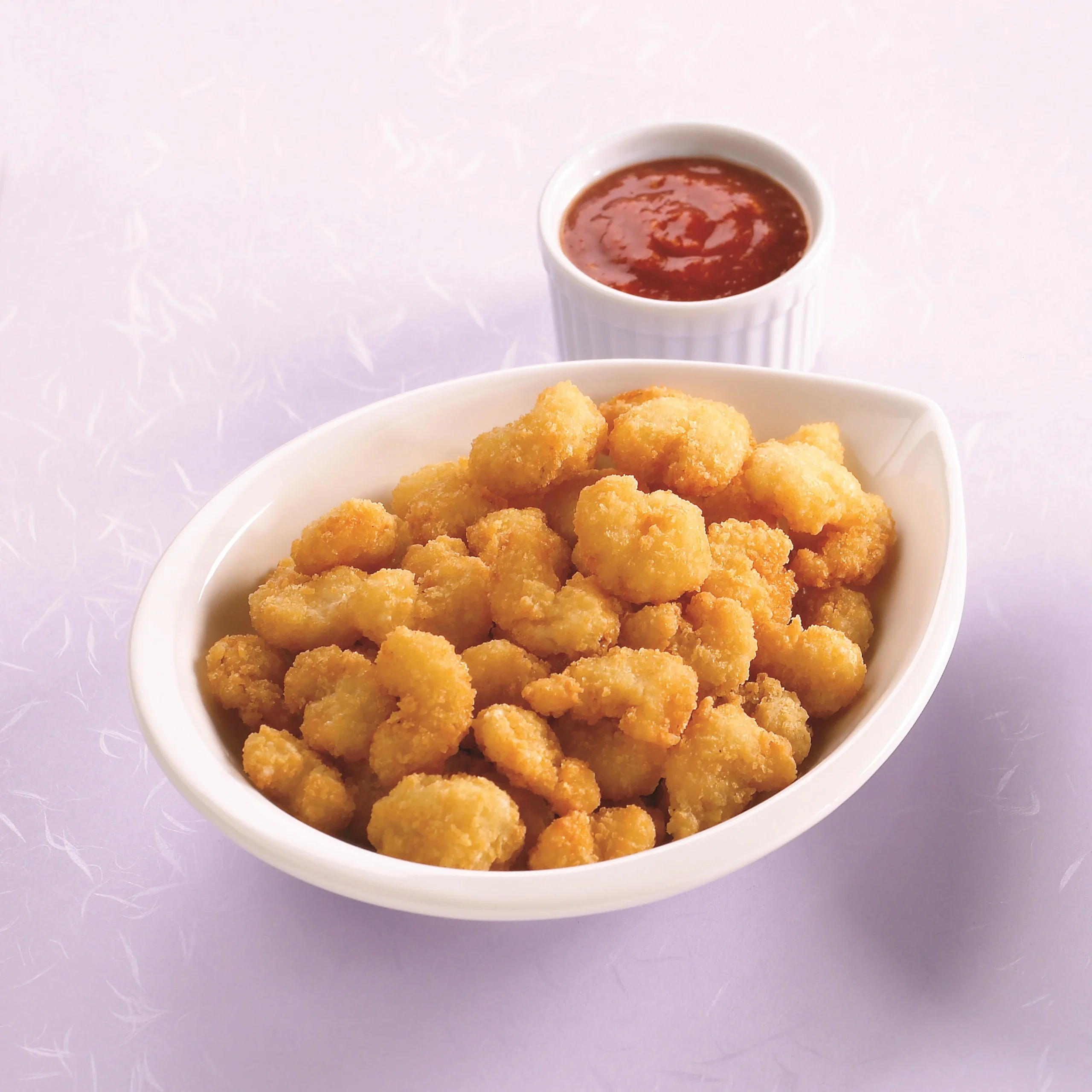 Raw Breaded Popcorn Style Shrimp Rounds Tail Off 3 Pound Each - 4 Per Case.