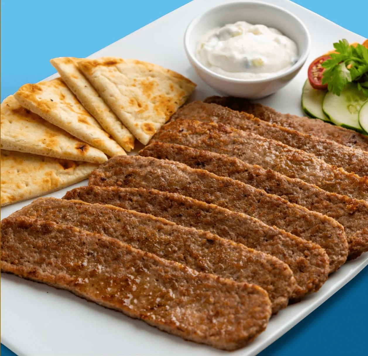 Devanco Individual Quick Frozen Gyro Slices 10 Pound Each - 1 Per Case.