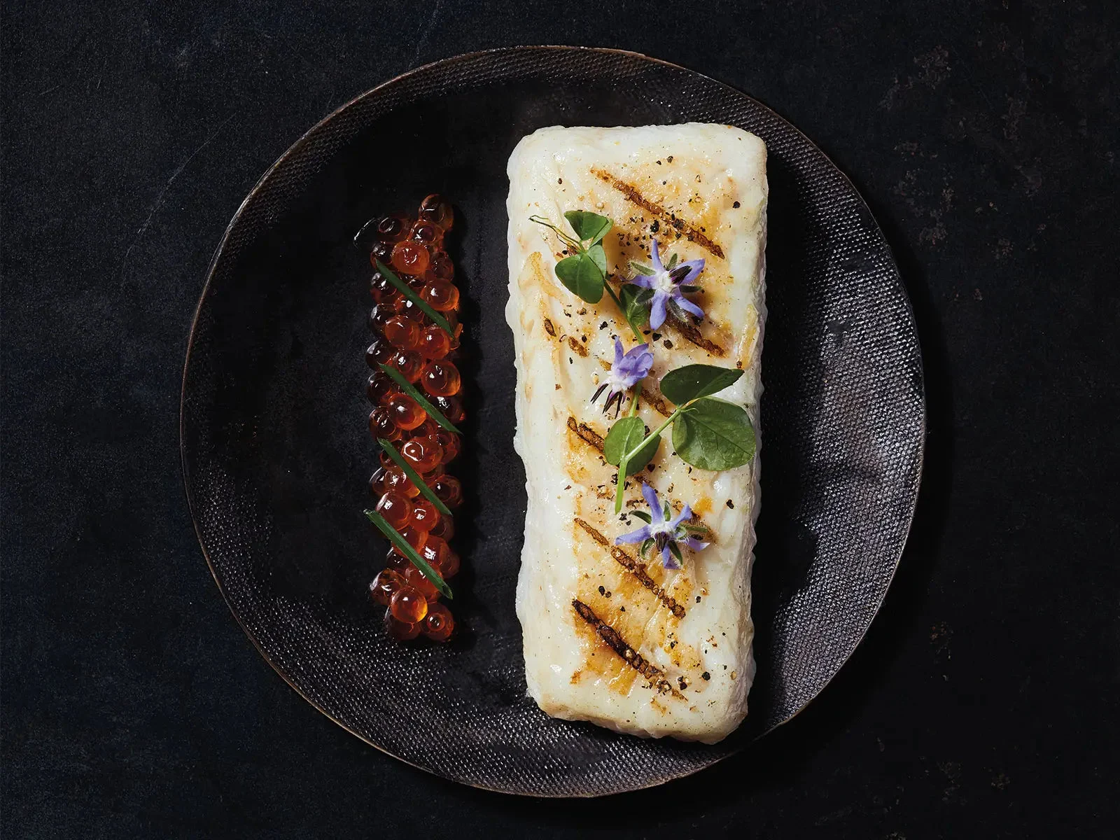 Trident Seafoods Entree Redi Alaskan Pollock Loin 4.5 Ounce Portions Individually Quick Frozen 10 Pound Each - 1 Per Case.
