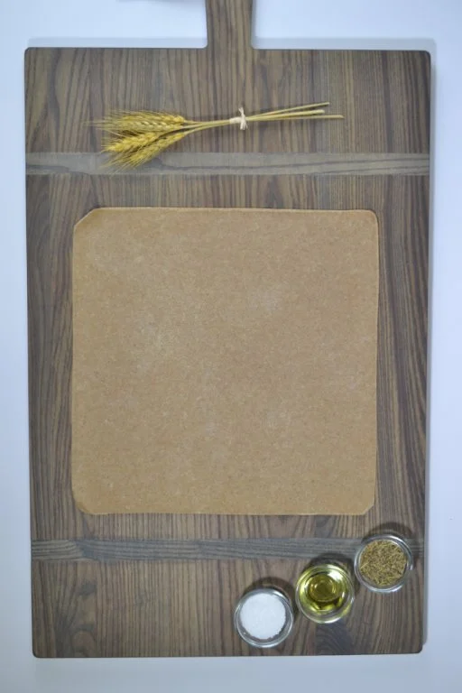 2 Inch Whole Wheat Original Thin Square Flatbread Par Baked Crust 7.8 Ounce Size - 40 Per Case.