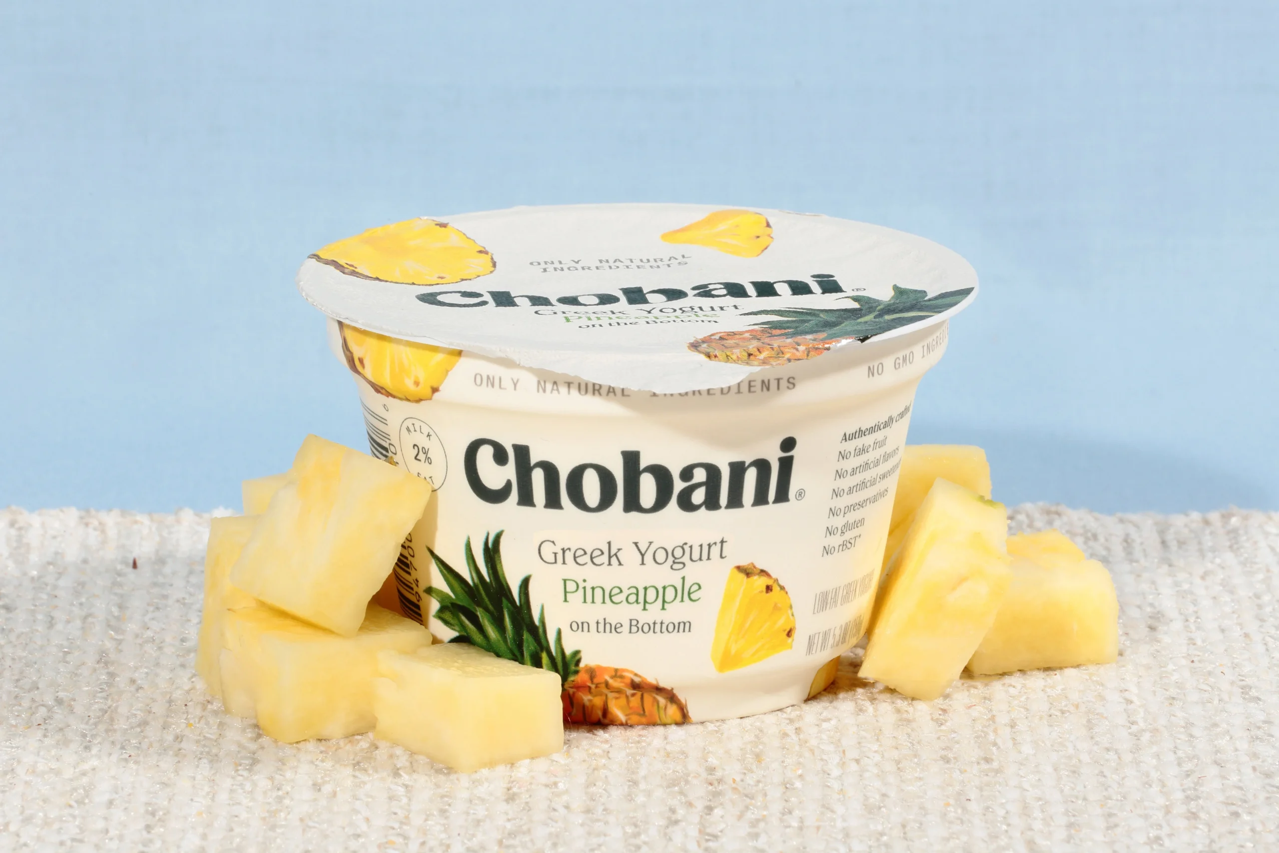 Chobani Low Fat Greek Yogurt Pineapple Onthe Bottom 5.3 Ounce Size - 12 Per Case.