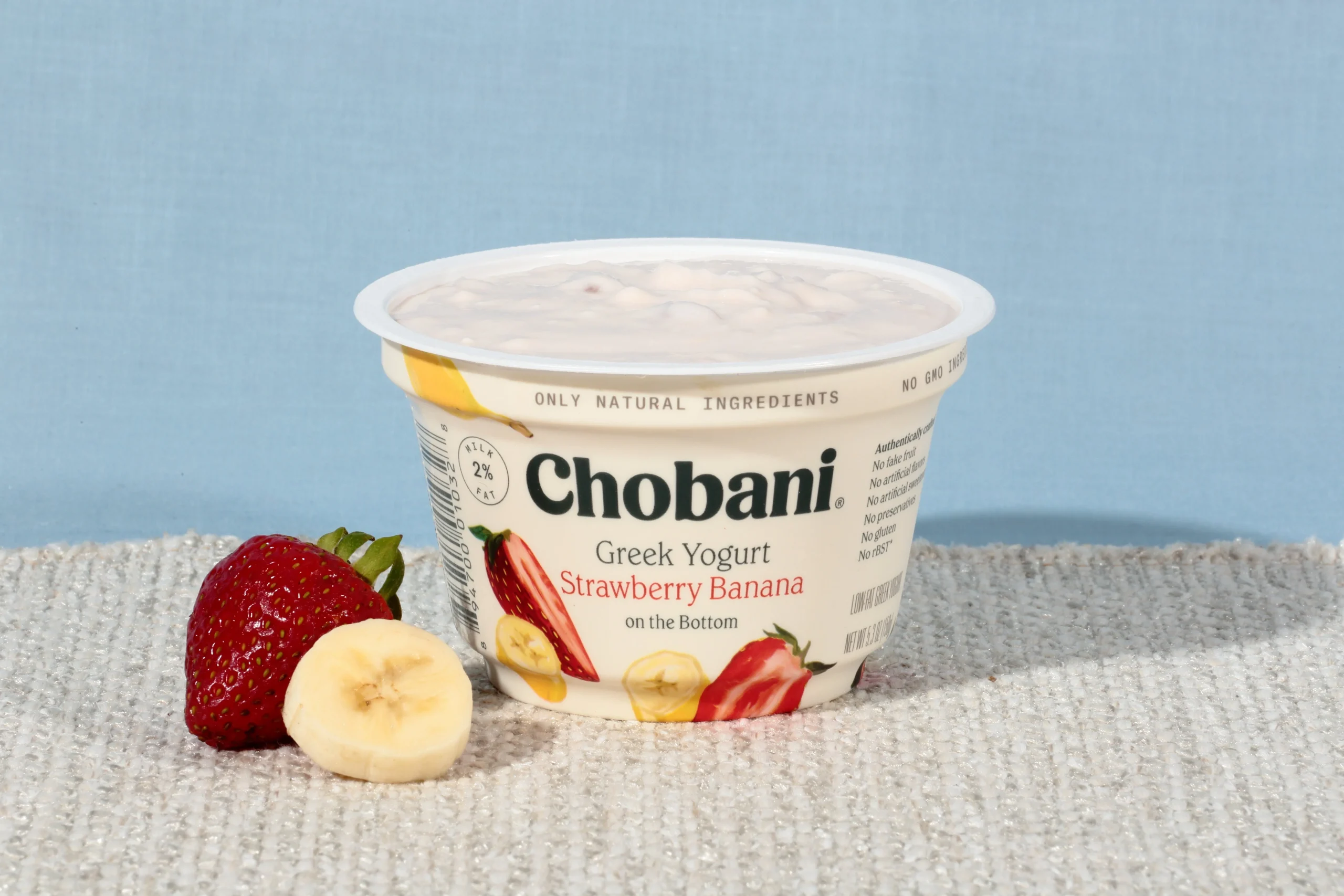 Chobani Non Fat Greek Yogurt Strawberry Banana On The Bottom 5.3 Ounce Size - 12 Per Case.